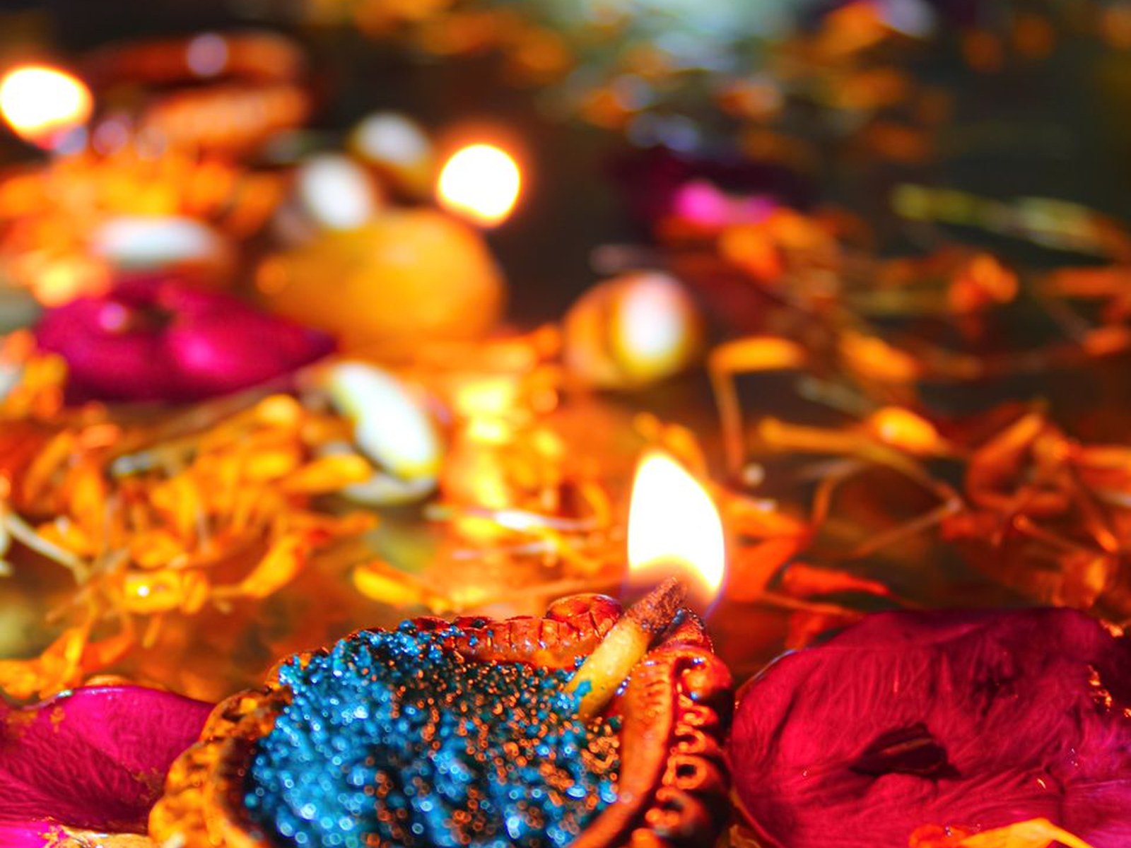 Diwali puja with lamps and decorations