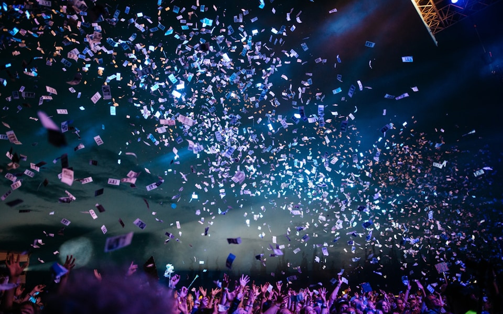 Crowd at a live concert with stage lights
